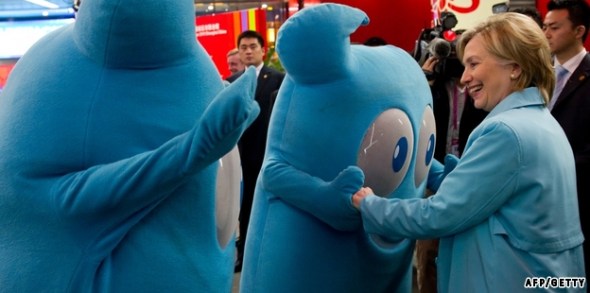 US Secretary of State Hillary Clinton greets Haibao, the mascot of the Shanghai World Expo 2010, while touring China's Pavilion in Shanghai, May 22, 2010.  US Secretary of State Hillary Clinton is in China on Friday for a visit set to culminate next week with wide-ranging talks in Beijing, with tensions running high over North Korea.     AFP PHOTO / POOL / Saul LOEB (Photo credit should read SAUL LOEB/AFP/Getty Images)